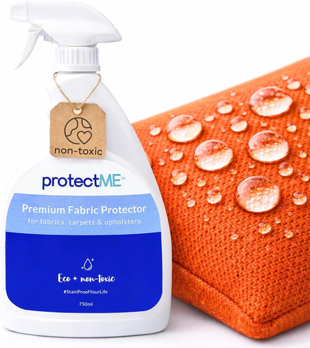 Fabric protector and stain - and,